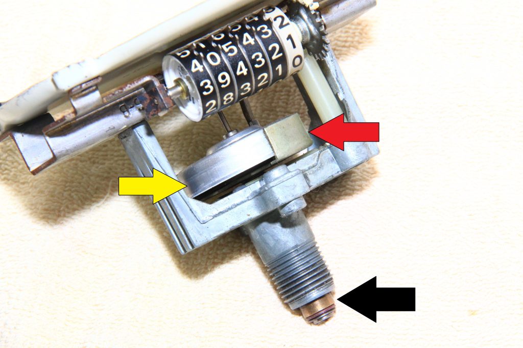 a disassembled speedometer and drive unit