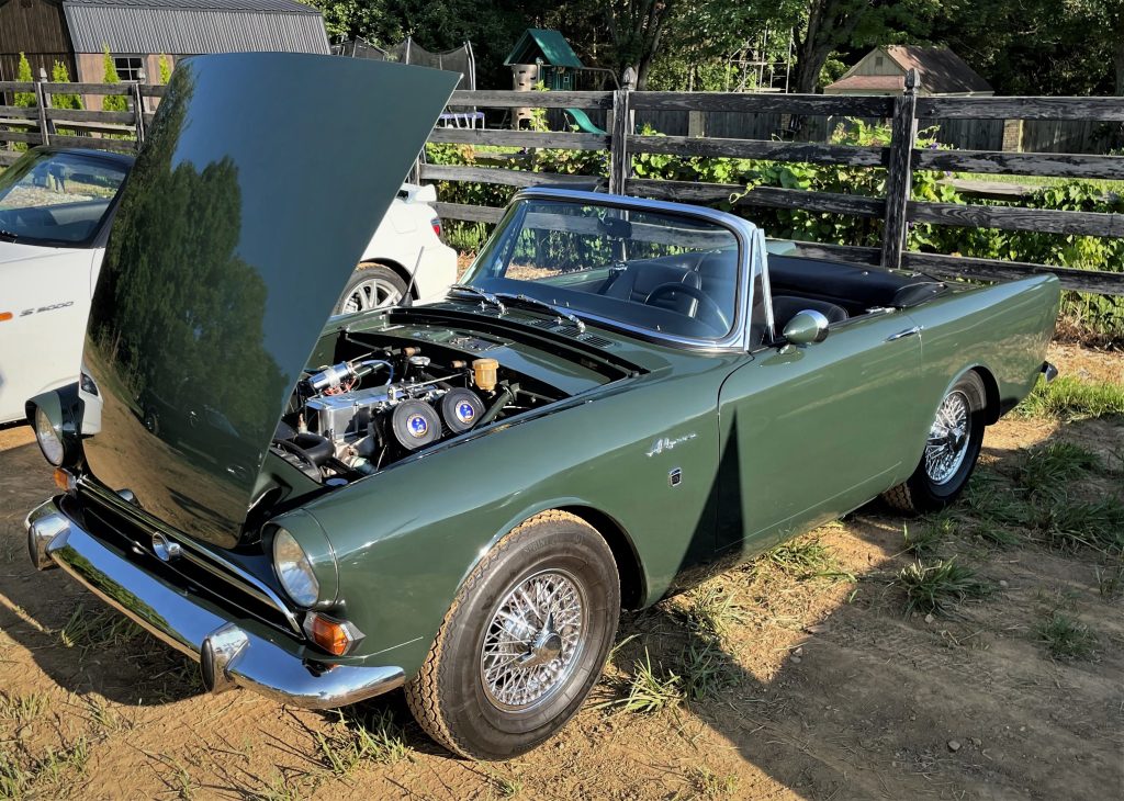 driver side view of a sunbeam alpine coupe