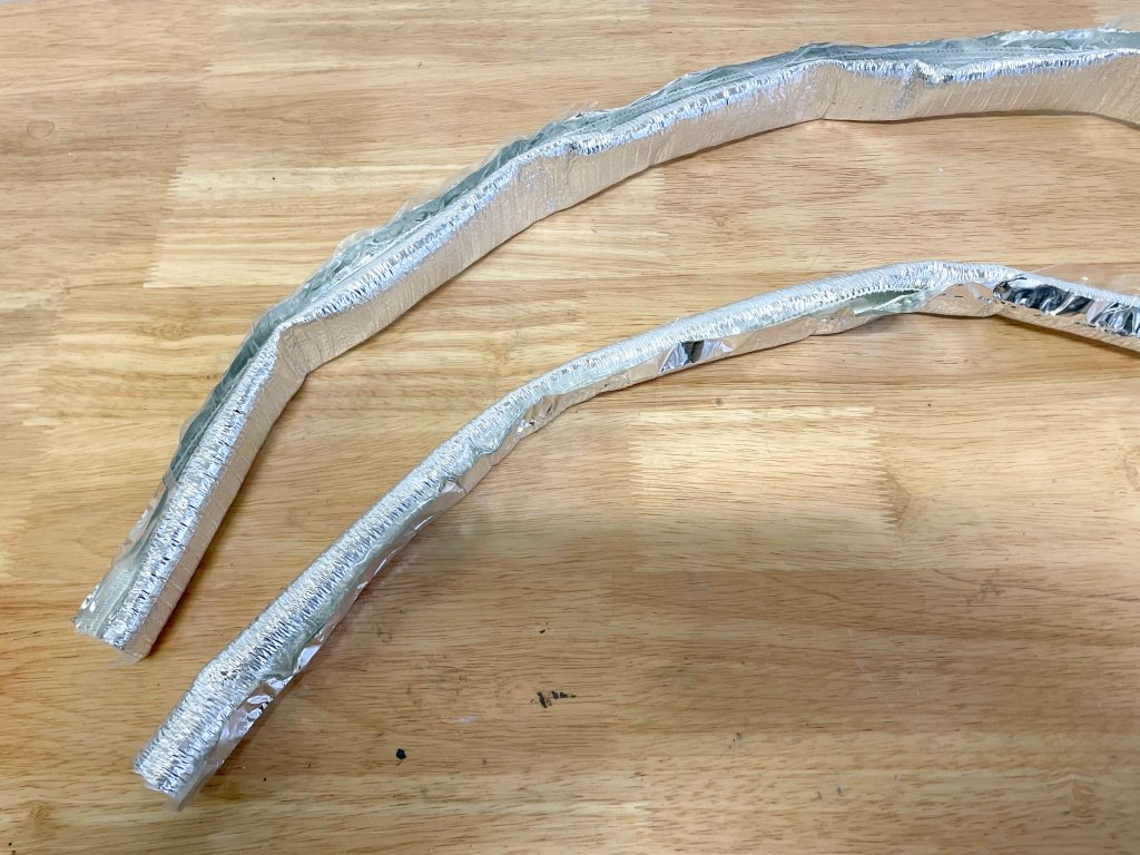 a pair of heat shield wire and hose wraps
