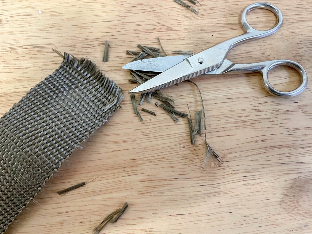 scissors cutting engine exhaust heat wrap