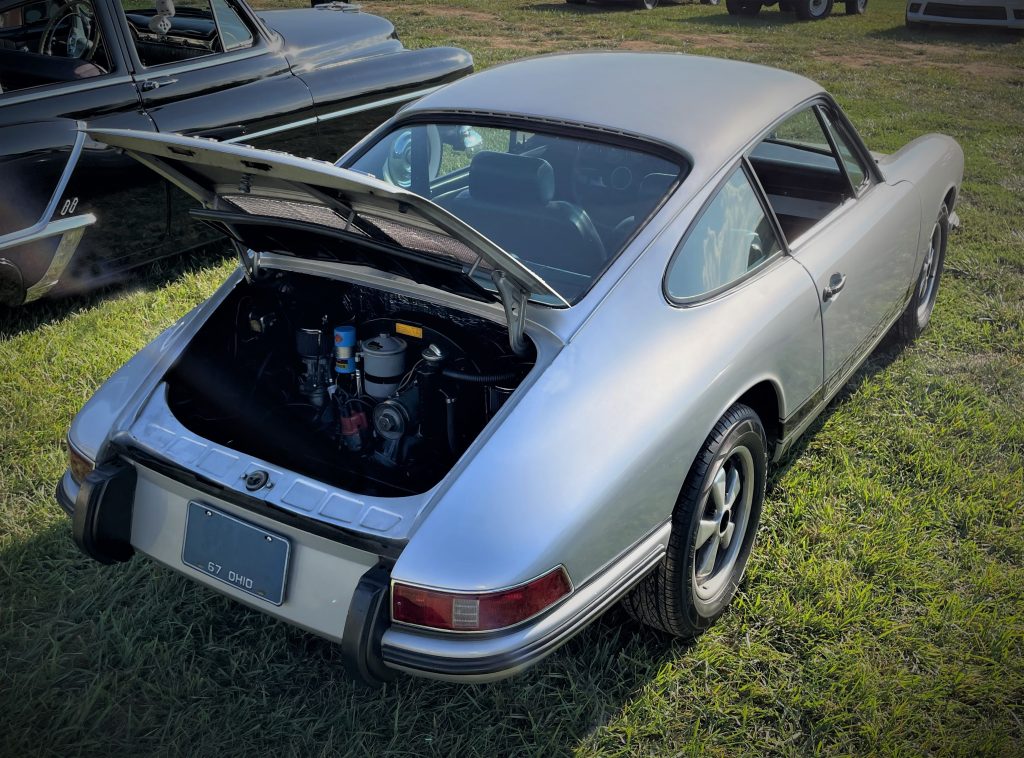 Rear passenger side View of a silver 1967 porsche 912