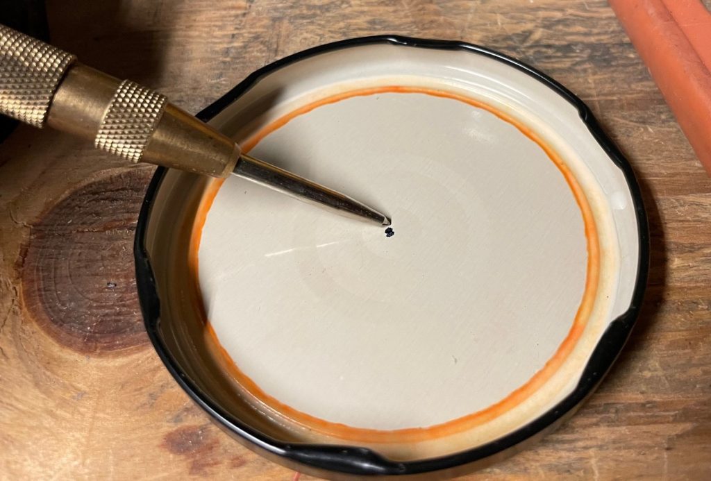 using a center punch on a salsa jar lid