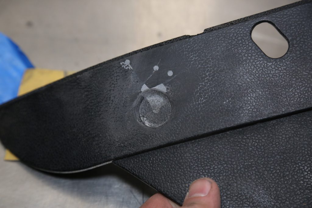 midway through repairs on a damage plastic trim panel