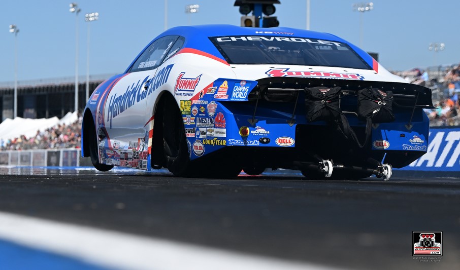 greg anderson pro stock nhra race car launching at event
