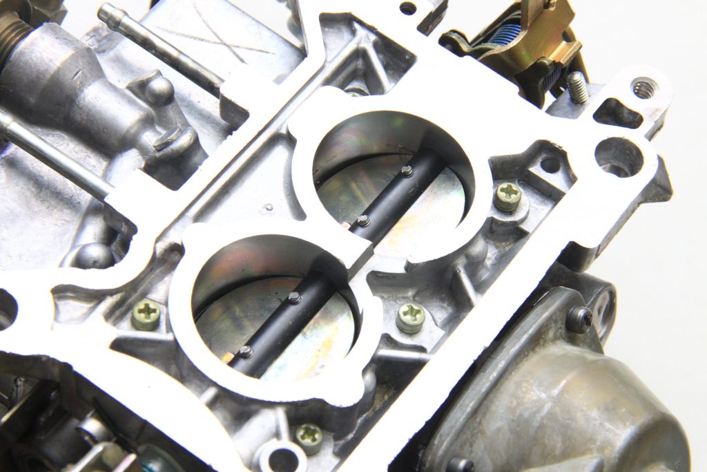 close up of throttle blades on a ford variable venturi Carburetor