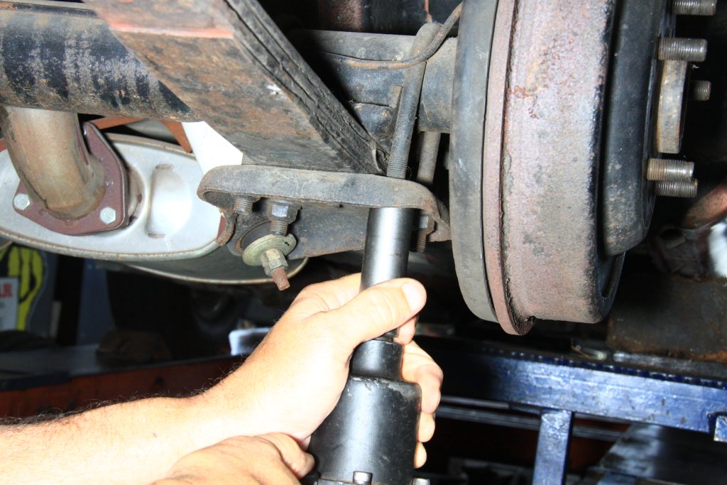removing bolts on leaf spring perch mount on a vintage car