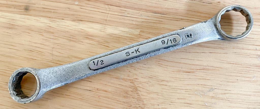 old S-K box end wrench on a table