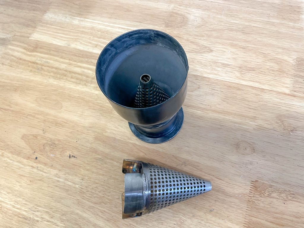 a perforated cone insert for a muffler