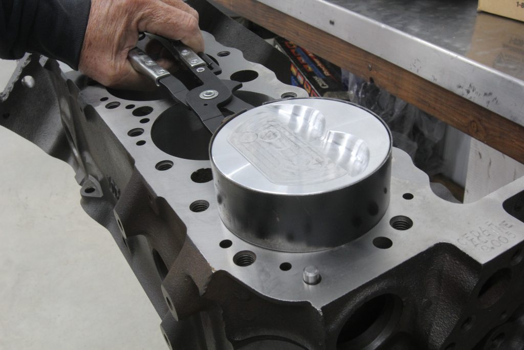 using a piston ring compressor on an engine