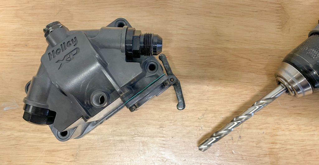 drilling out a stripped hole on a holley fuel manifold