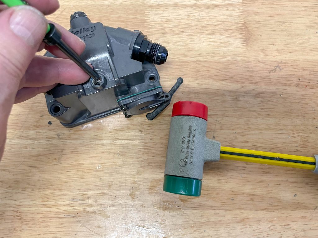 hammering thread repair insert in a drilled hole