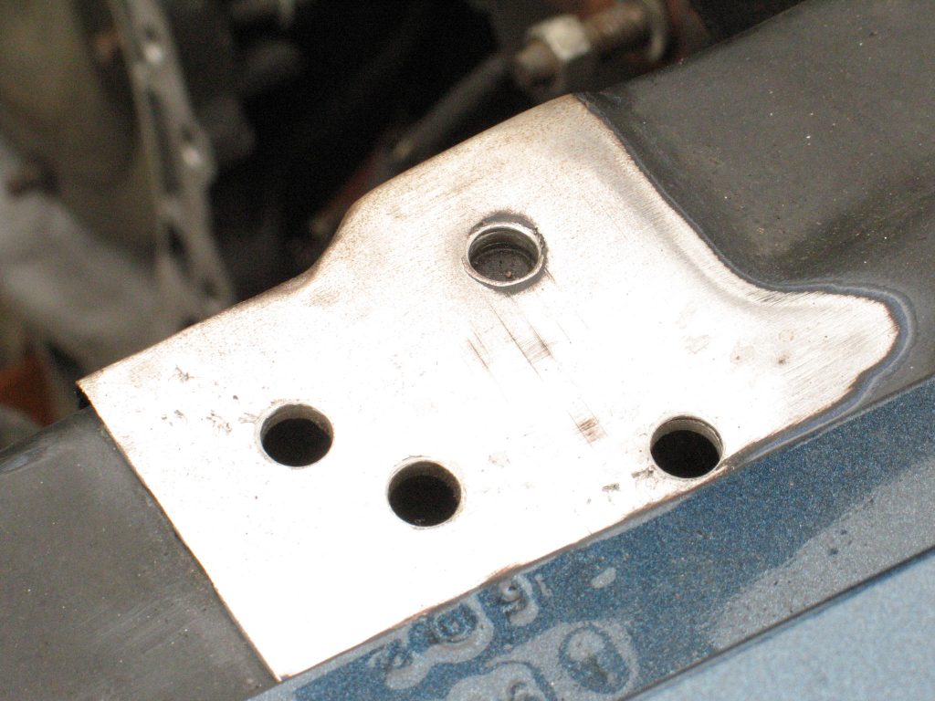 a cleaned section of a vintage ford mustang fender