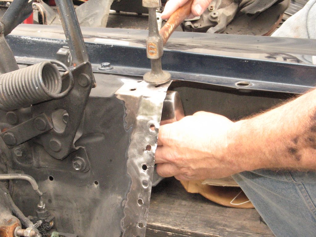using a hammer and dolly to fix sheetmetal