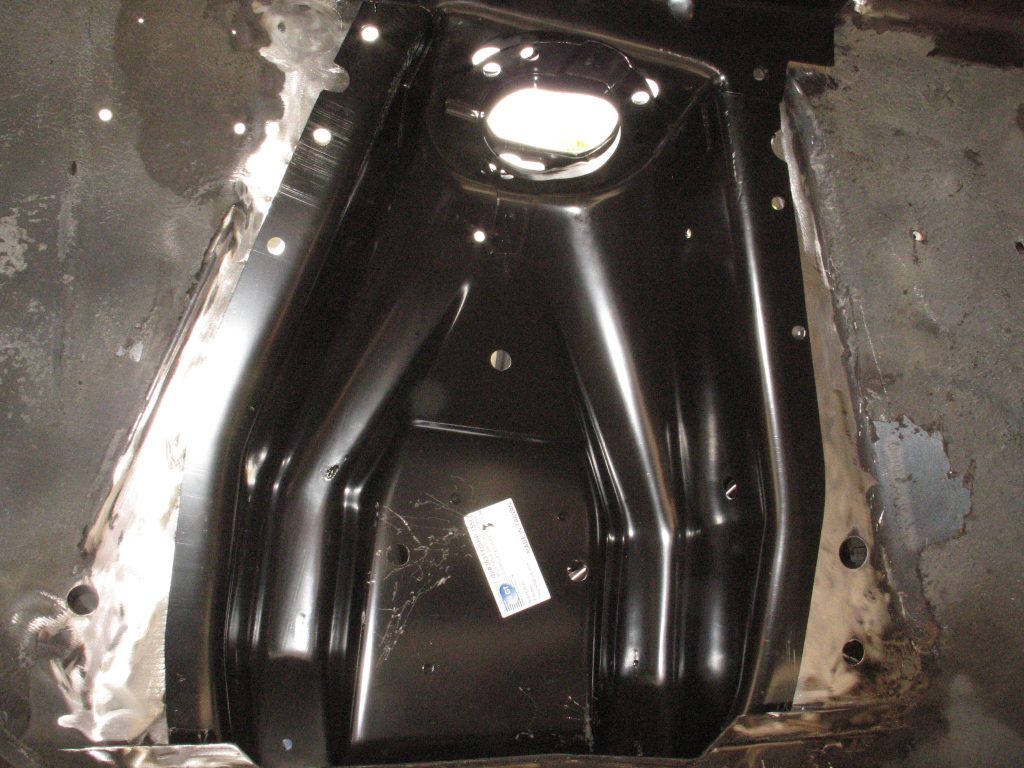 replacement shock tower in a ford mustang fender