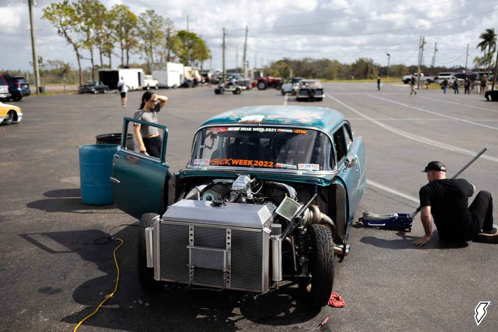 alex taylor working on her 1955 chevy 210 during sick week