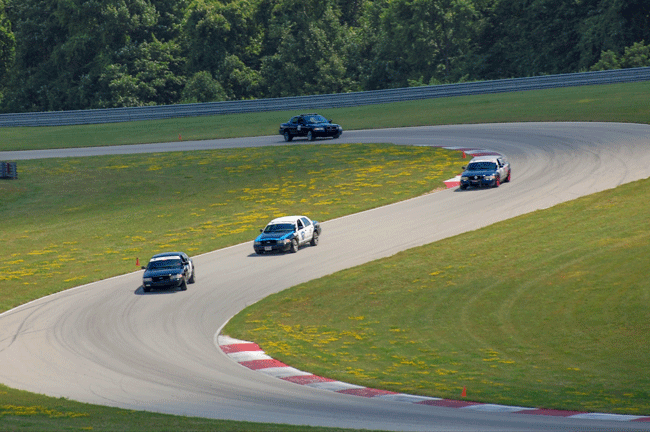 spec ford panther racing cars on track