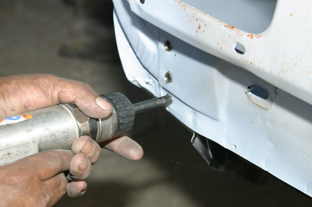 drilling out spot welds on a vintage car body