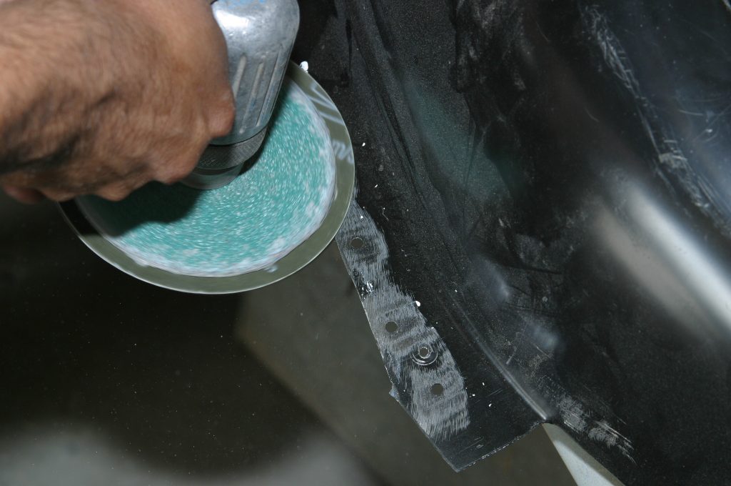 grinding paint away prior to welding
