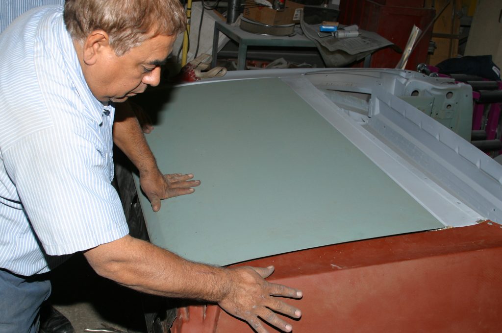 checking for panel gaps in a replacement car quarter