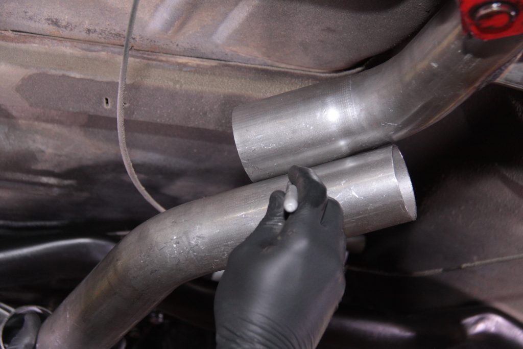 marking exhaust tubing sections prior to cutting