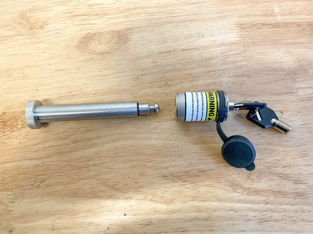Hitch Pin and lock set on table