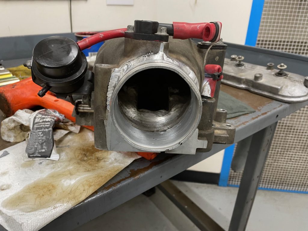 throttle body port on an intake manifold
