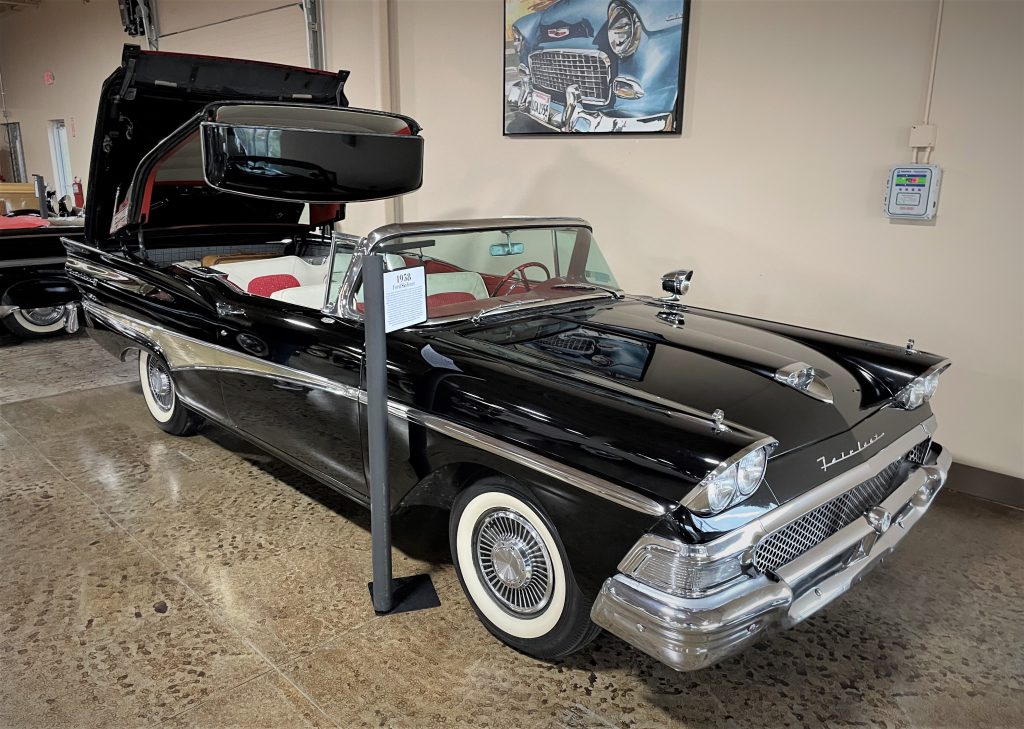 1958 ford skyliner with roof partially retracted