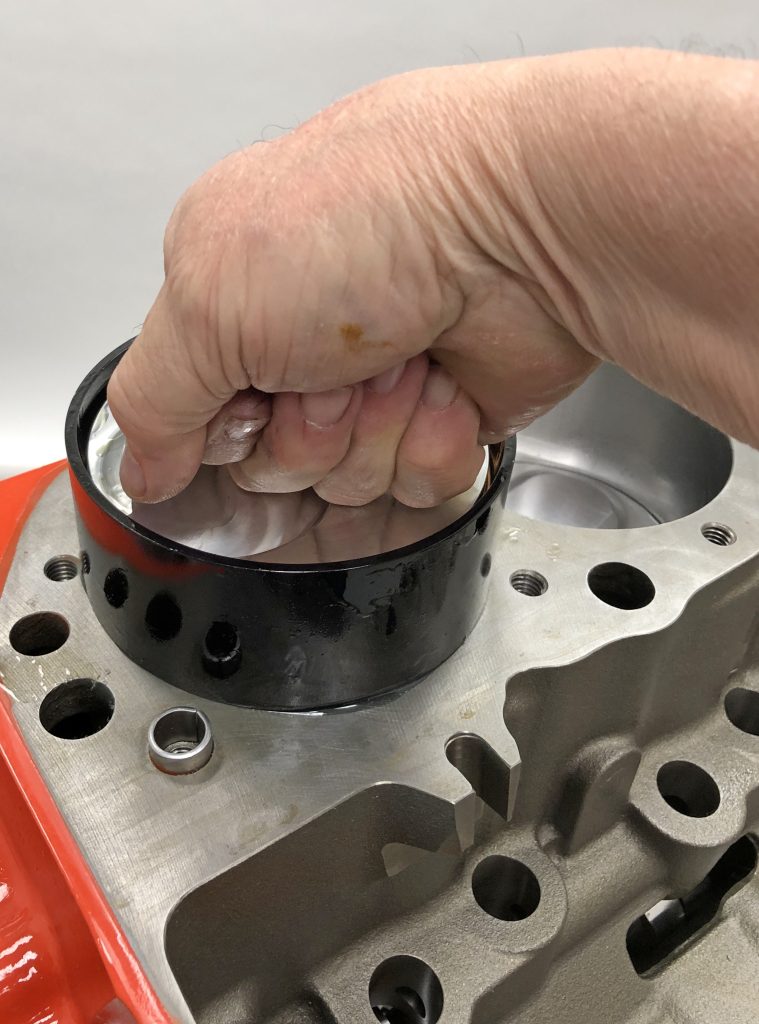 installing pistons with ring compressor