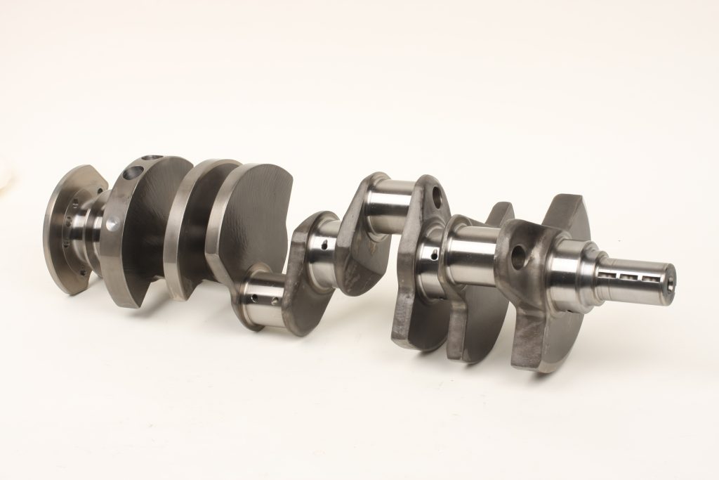 v8 crankshaft on a table