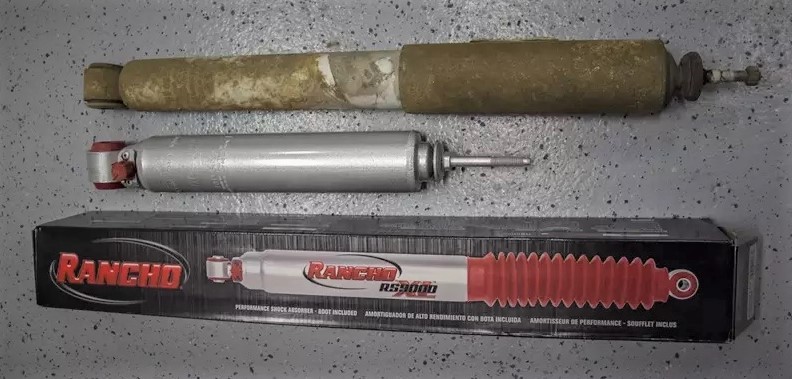 new rancho shock resting near old 4x4 blown shock