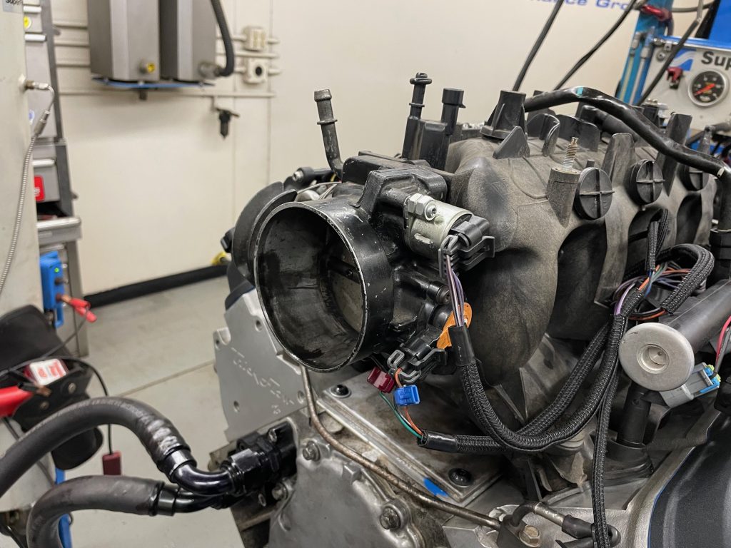 close up of the mouth of an ls engine throttle body