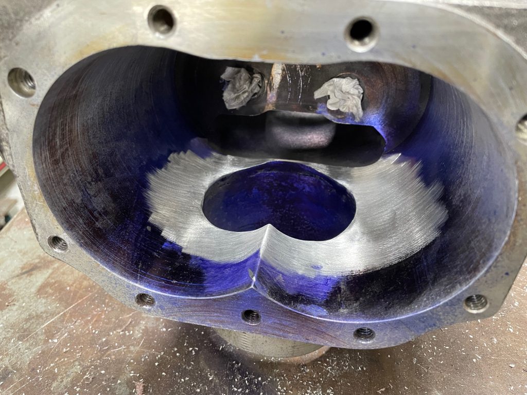 adapter hole for carburetor in supercharger housing