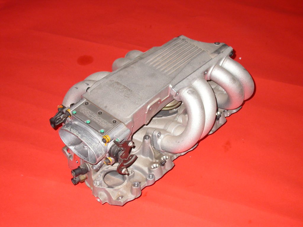 gm TPI Manifold on table