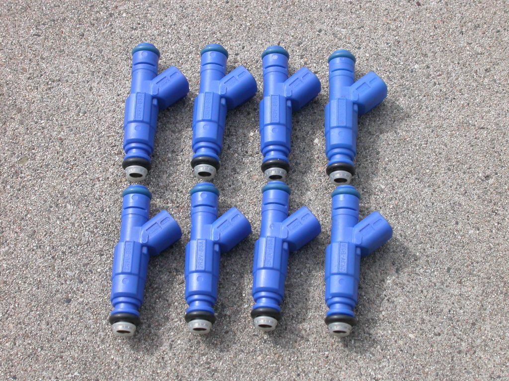 fuel injectors arranged on a table