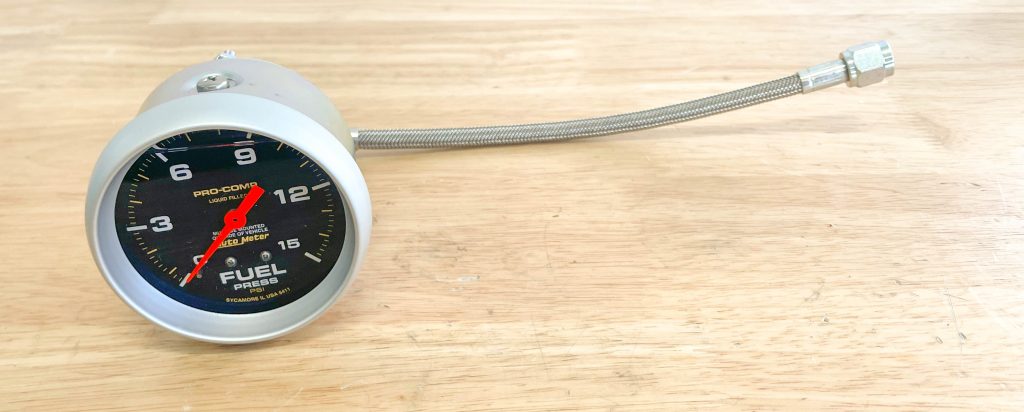 fuel pressure gauge resting on a table