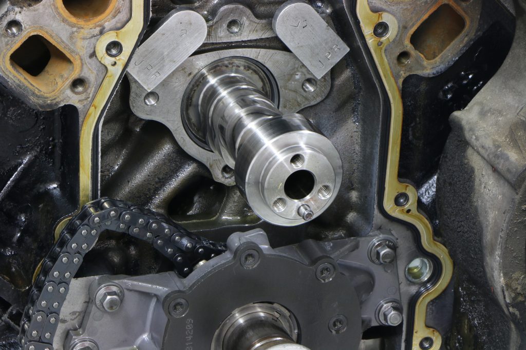 camshaft getting installed in an ls engine