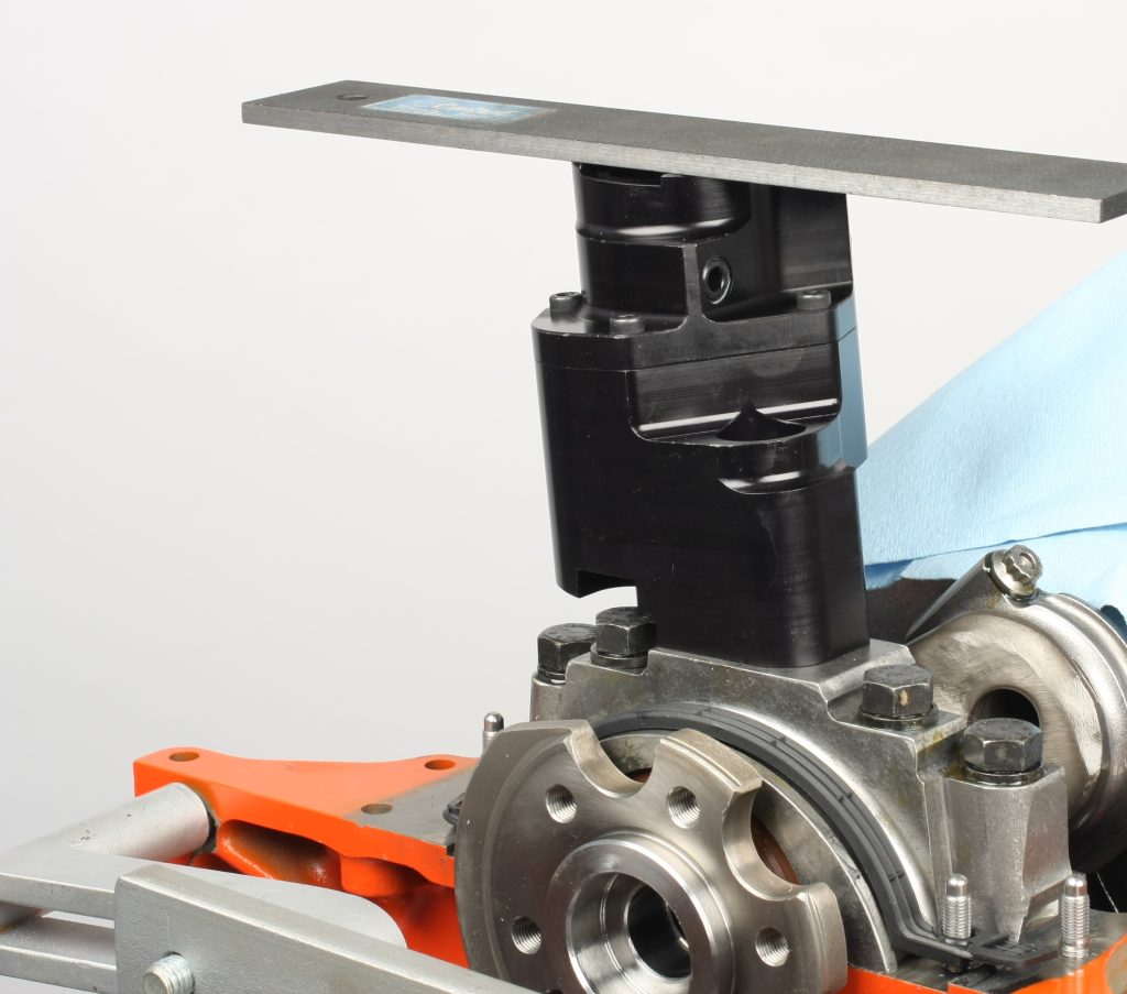 using a flatedge to measure flatness on an engine