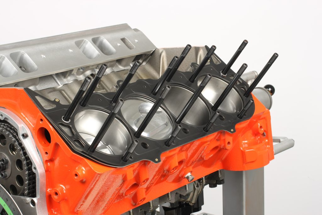 cylinder head studs installed on a v8 deck