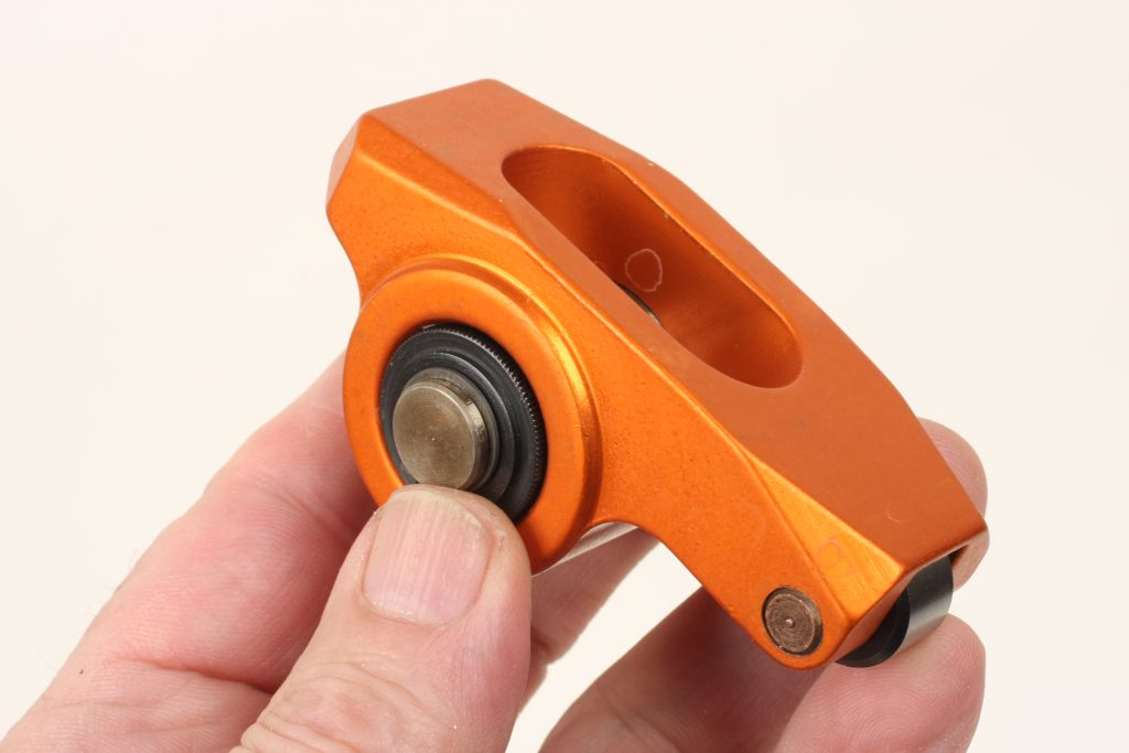 man holding a performance rocker arm