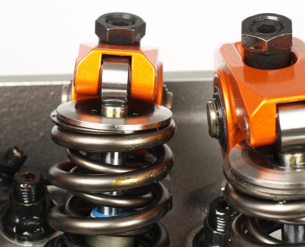 close up of valve spring and roller tip rocker arm