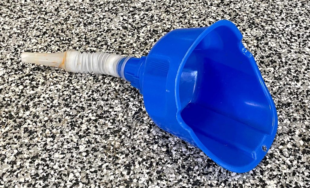 large blue engine oil funnel
