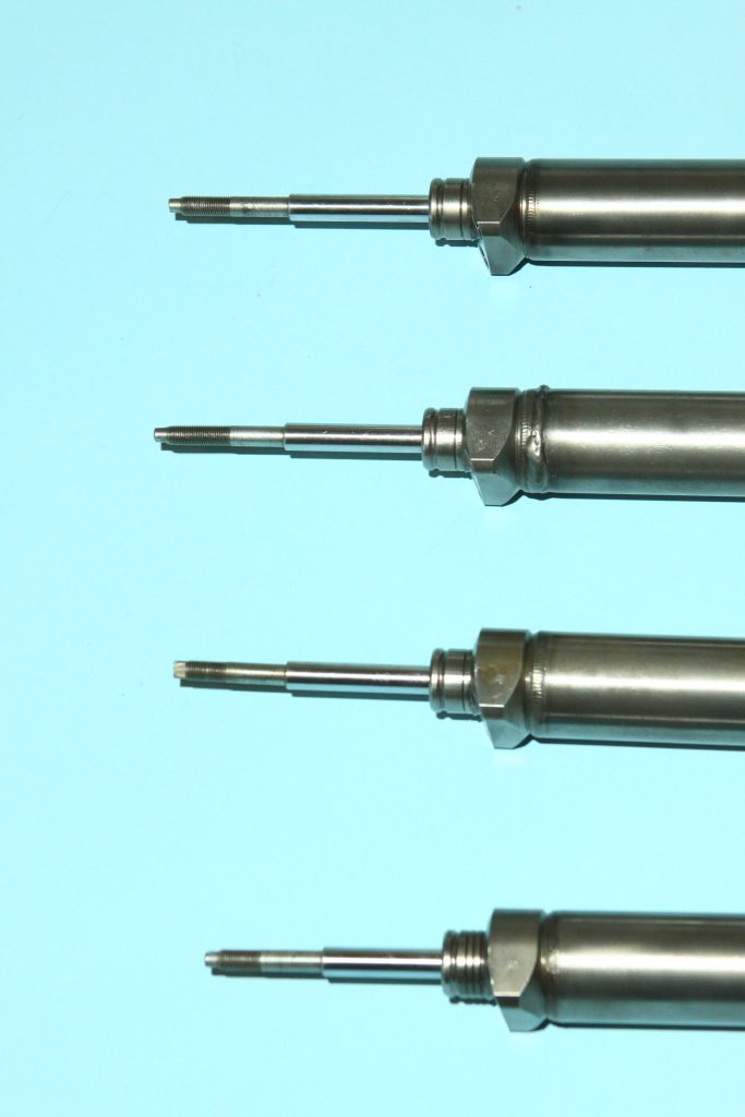 close up of tips on ford power steering cylinders
