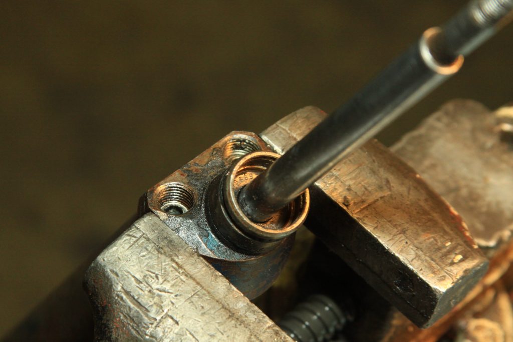power steering piston in a vise