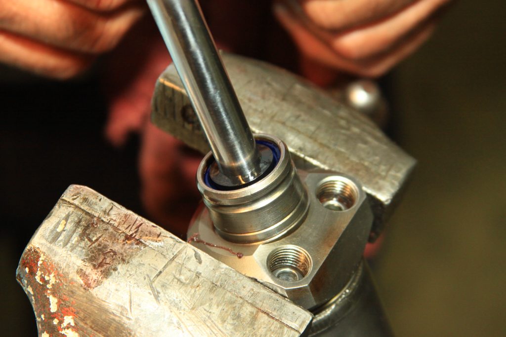 pressing a seal into a hydraulic cylinder