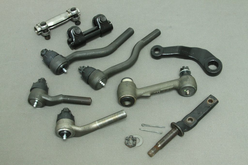 vintage ford steering parts on a table