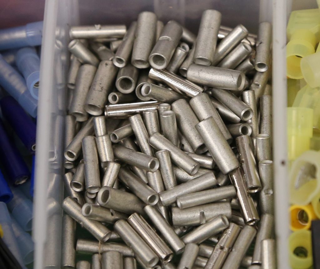 a collection of wire ferrules and collars
