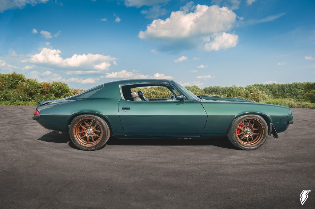 side profile shot of a custom 1974 Chevy Camaro