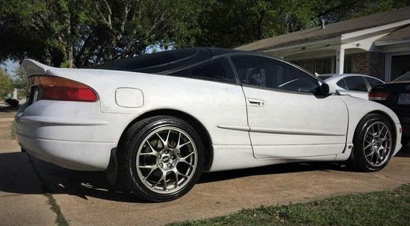 white eagle talon in a driveway