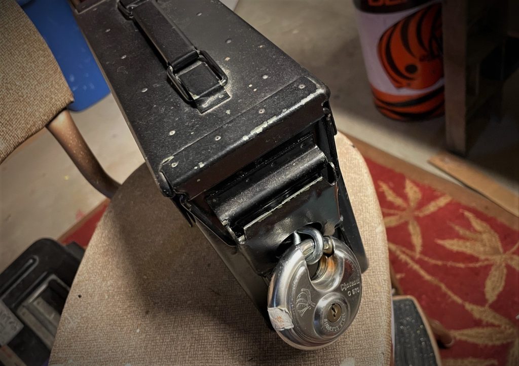 ammo can with padlock installed