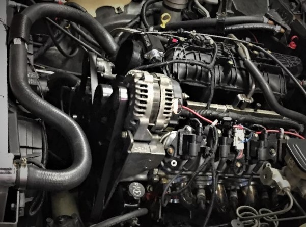 close up of hoses and lines in an ls engine